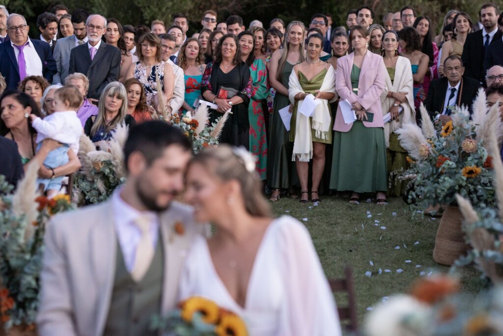 The couple during an outdoor ceremony